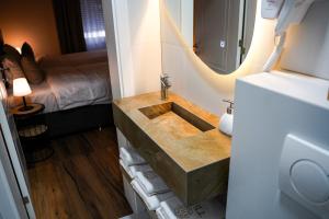 Postel nebo postele na pokoji v ubytování TEN Guest House