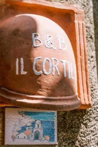 Certifikát, hodnocení, plakát nebo jiný dokument vystavený v ubytování B&B IL CORTILE