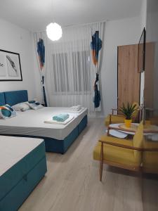 Postel nebo postele na pokoji v ubytování Jes Apartments