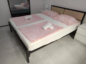 Katil atau katil-katil dalam bilik di Apartments Oleandar