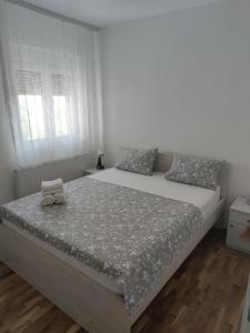 Postel nebo postele na pokoji v ubytování Apartman 022