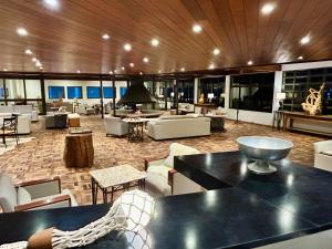 Uma área de estar em Samuara Hotel Caxias do Sul