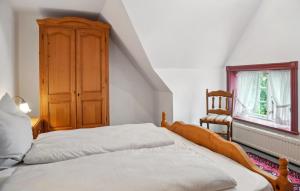 Postel nebo postele na pokoji v ubytování 2 Bedroom Amazing Apartment In Dagebüll