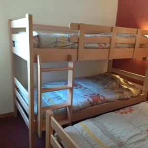 a couple of bunk beds in a room at Valmorel in Valmorel