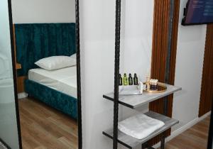 Voodi või voodid majutusasutuse Apollonia Hotel toas