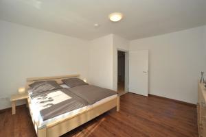 Postel nebo postele na pokoji v ubytování Ferienwohnung Refugium