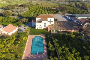 an aerial view of a house with a swimming pool at Barone GR Macrì Agriturismo Modi in Gerace
