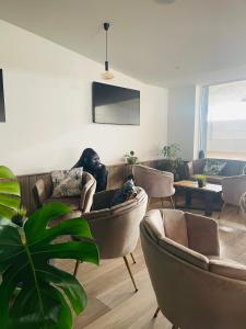 Posezení v ubytování Equus B&B