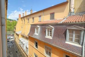 an overhead view of a building with windows at LaBolla, charmant cocon avec spa, cœur de Lyon in Lyon