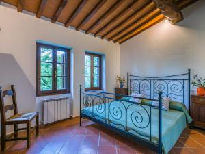 Ένα ή περισσότερα κρεβάτια σε δωμάτιο στο Holiday Home Cerretino Tettoia by Interhome