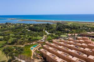 an aerial view of the resort with the ocean in the background at Palmares Signature Apartments in Lagos
