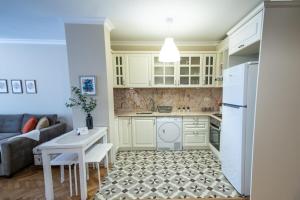 Kuchyň nebo kuchyňský kout v ubytování Cukurcuma 2br Apt Stylish Interior