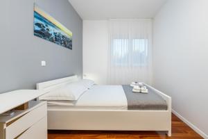 Posteľ alebo postele v izbe v ubytovaní Villa Karmen