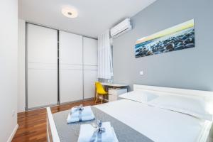 Posteľ alebo postele v izbe v ubytovaní Villa Karmen
