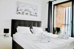Krevet ili kreveti u jedinici u okviru objekta Aspectus apartmani Divcibare