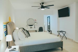 Voodi või voodid majutusasutuse Casa de Playa Hatillo toas