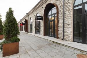 an empty street in front of a building at Uus Volta in Tallinn