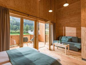 Postel nebo postele na pokoji v ubytování Refugium Dolomiten & Chalet