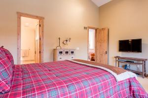 Voodi või voodid majutusasutuse Angani Way Townhome 102 toas +44 fotot