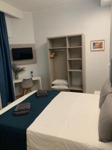 TV a/nebo společenská místnost v ubytování Fla Rooms