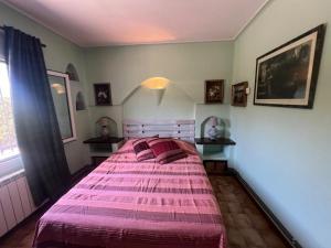 Postel nebo postele na pokoji v ubytování Vall gran 12