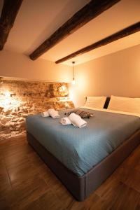 Posteľ alebo postele v izbe v ubytovaní Agora Boutique Apartments Ioannina