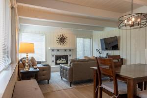 a living room with a couch and a table at Villager Condo 1207 in Sun Valley