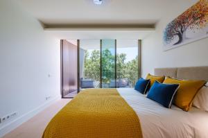 Ένα ή περισσότερα κρεβάτια σε δωμάτιο στο Portugal Portfolio - Legacy Apartment +68 φωτογραφίες