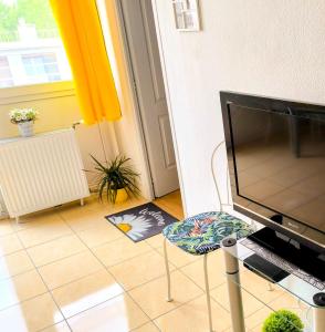 A television and/or entertainment centre at Atlantis apartman