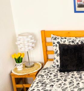 A bed or beds in a room at Atlantis apartman