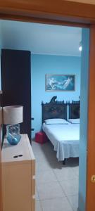 A bed or beds in a room at Villa Linda Bed And Breakfast