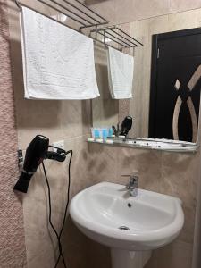 Koupelna v ubytování Hotel Argo