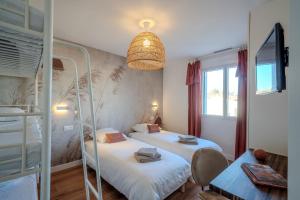 Postel nebo postele na pokoji v ubytování L'écho des Vagues + 18 fotografií