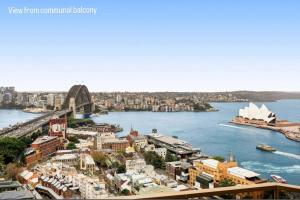 an aerial view of a city with a harbor at Amazing Sydney Apartment with Pool, Gym and Sauna in Sydney +25 photos