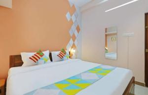 Ένα ή περισσότερα κρεβάτια σε δωμάτιο στο Anu Home Stay 1