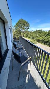 Balkón nebo terasa v ubytování Superbe appartement avec vue sur la foret du Touquet Résidence les Dunes