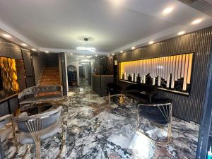 Posezení v ubytování Crowned Exclusive Hotel