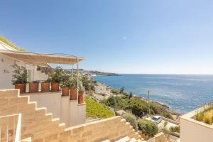 a view of the ocean from a house at Pajara Marinaia - Antica Liama salentina in Marittima