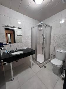 Koupelna v ubytování Hotel Argo