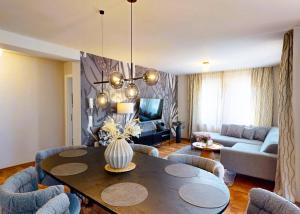 Area soggiorno di Edelweiss Appartements 'MÜHLENKOPF' deluxe - inkl Wellness-Spa und MeineCardPlus