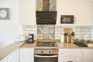 Kuchyň nebo kuchyňský kout v ubytování Apartment Ocean Albir