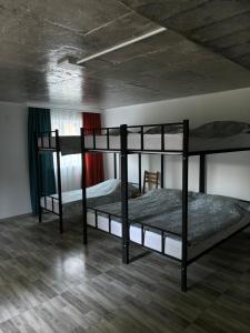 Ένα ή περισσότερα κρεβάτια σε δωμάτιο στο Hostel VANTA