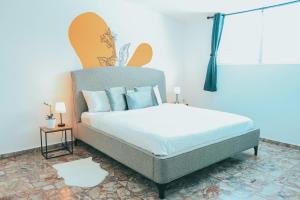 Voodi või voodid majutusasutuse Casa de Playa Hatillo toas