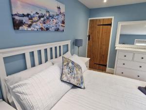 Postel nebo postele na pokoji v ubytování Stylish Little Bowden Retreat - Market Harborough