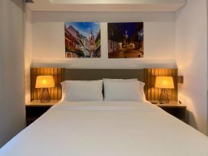 Voodi või voodid majutusasutuse Wynwood Cartagena Beach toas