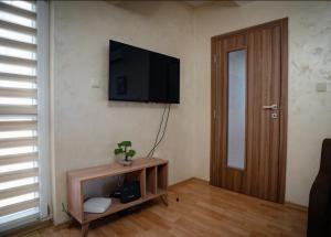 A television and/or entertainment centre at Apart Centar