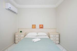 Postel nebo postele na pokoji v ubytování GRJA032- Tranquilidade na Av. Atlântica com 4Q+3WC