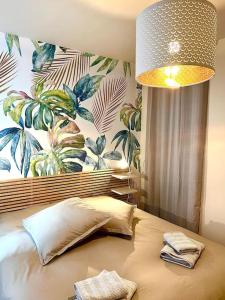 Postel nebo postele na pokoji v ubytování Magnifique appartement vue îles et océan-seaside- + 23 fotografií