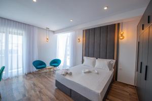 Voodi või voodid majutusasutuse Cataleya Resort toas