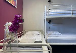 Postel nebo postele na pokoji v ubytování Crafoord Place Hostel